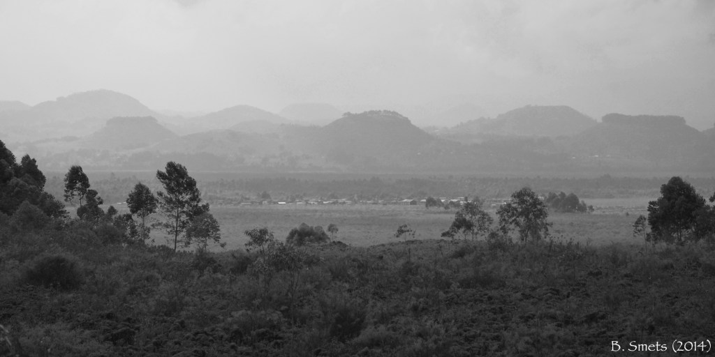 Volcanic cones in the lava plain of Karisimbi volcano. June 28, 2014